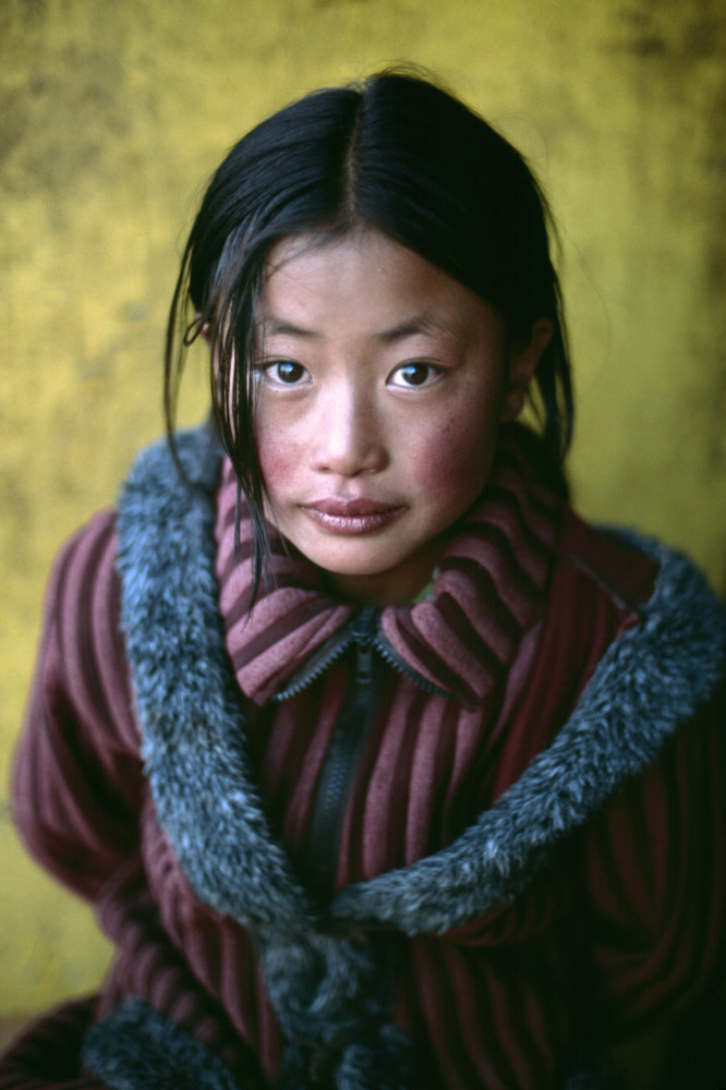 Girl in a Chinese coat, Xigaze, Tibet, 2001